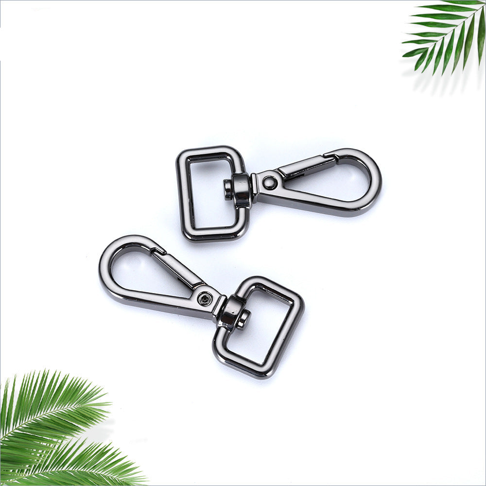 Fish mouth buckle secures shoulder strap hardware plate buckle