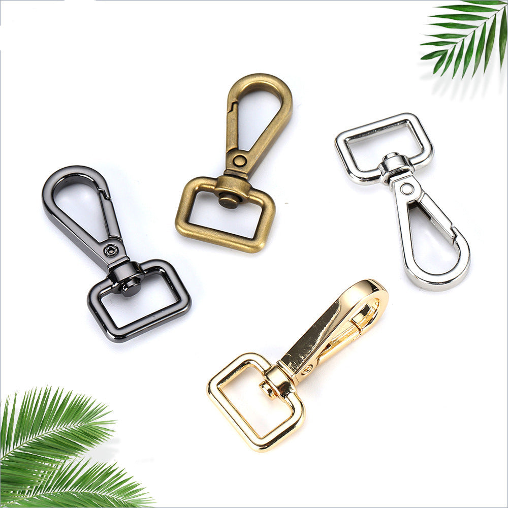 Fish mouth buckle secures shoulder strap hardware plate buckle